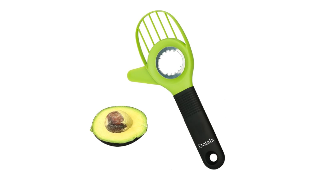 3-in-1 avocado tool removing the pit from an avocado